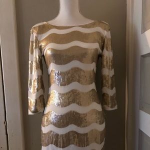 Women’s gold backless sequin dress